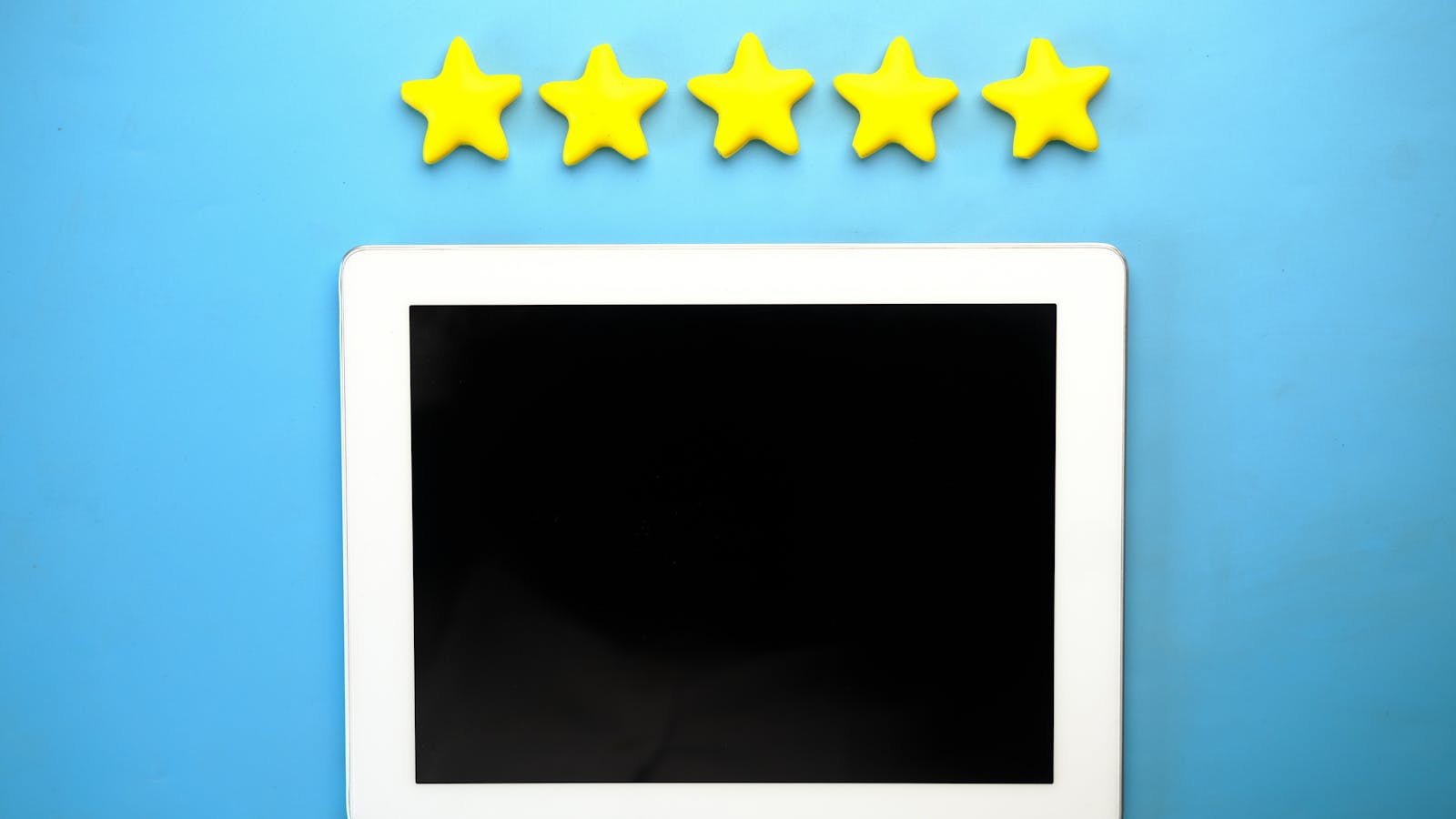A close-up of a 5-star review on a smartphone with stars highlighted, representing the moment a satisfied customer leaves positive feedback for a service business.